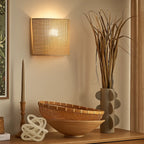 Soft, warm glow from the ORLUNE HOME Natural Rattan Woven Wall Light enhances any space.