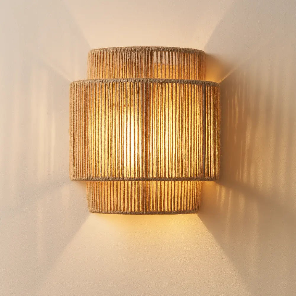 Warm, soft glow from woven rattan shade creates unique striped shadows on your wall.