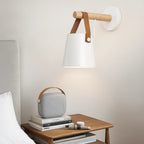 The ORLUNE HOME wall light emits a cozy, soft glow, perfect for relaxing.