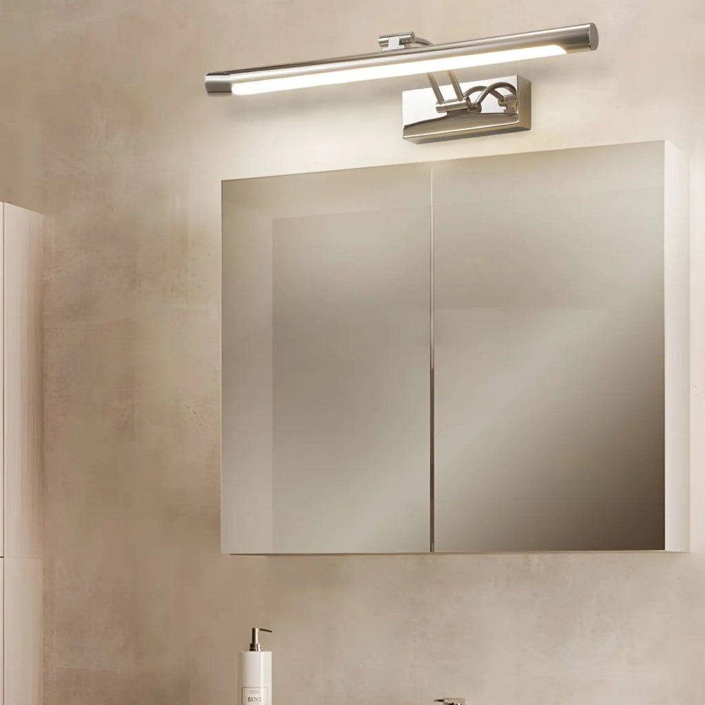 The Modern Aluminum LED Bathroom Wall Light shines softly, mounted on a sleek beige wall.