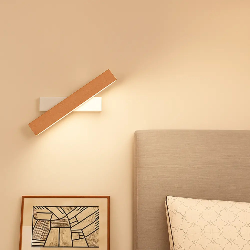 The Rotating Nordic Style Wooden LED Wall Light creates a soft, welcoming illumination.