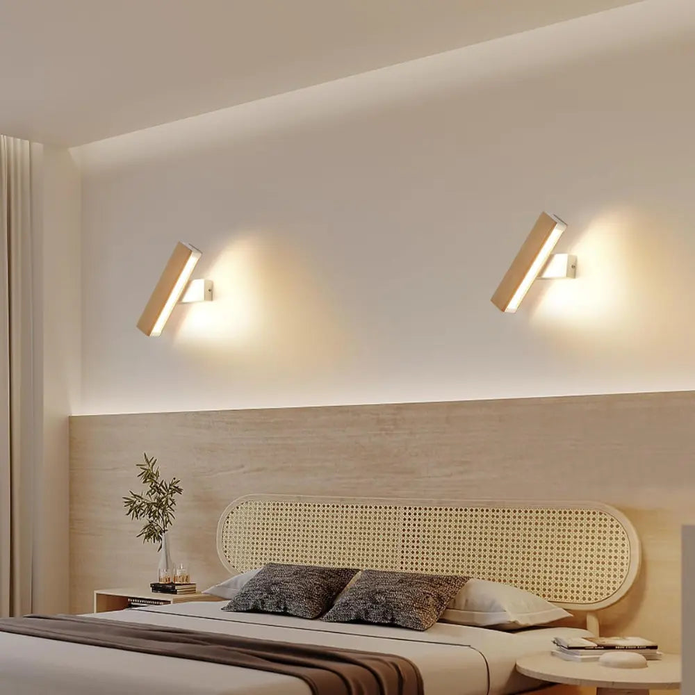 ORLUNE HOME Rotating Nordic LED Wall Lights cast a warm, inviting ambiance overhead.