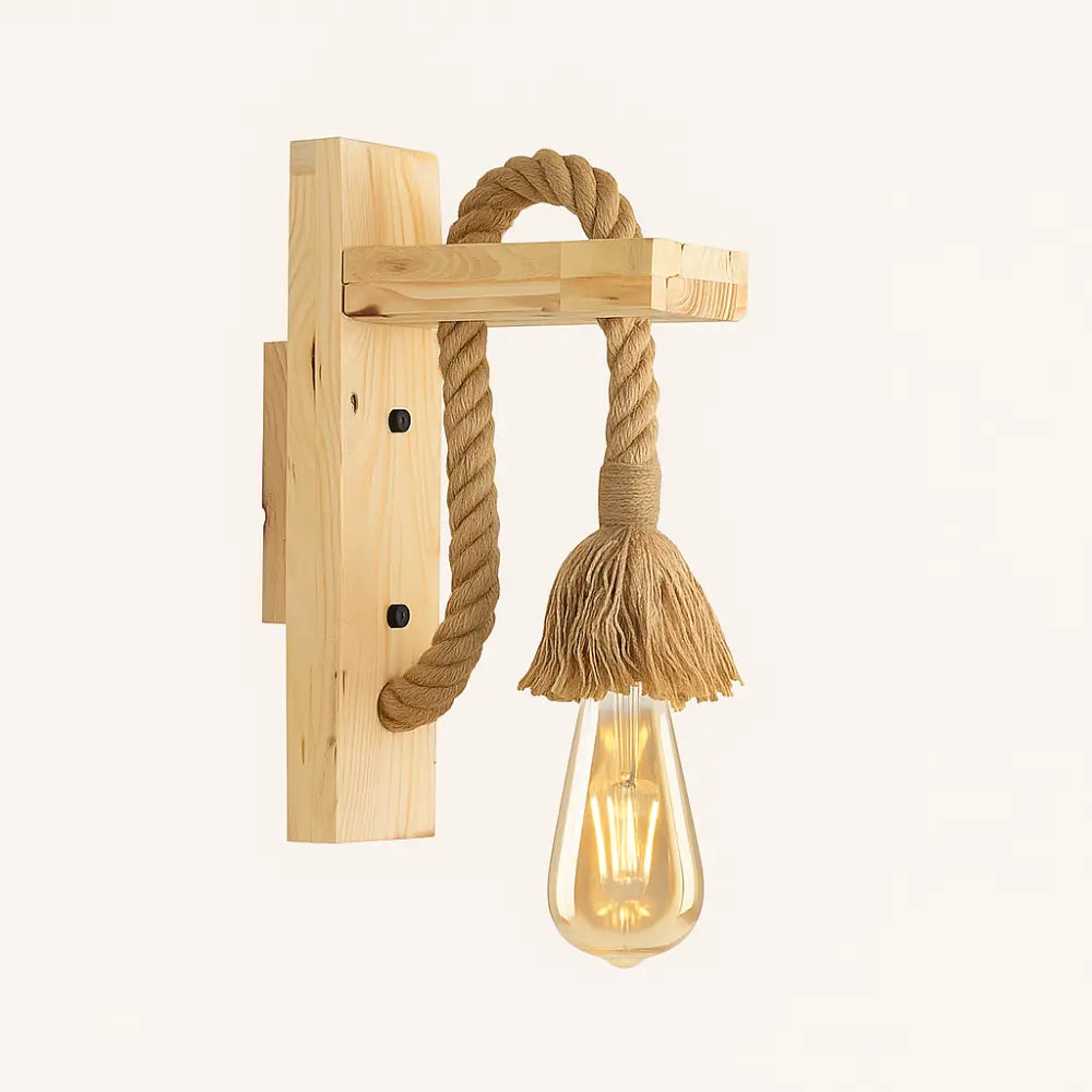 Warm, ambient glow from hemp rope and exposed bulb creates stunning rustic wall lighting.