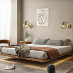 ORLUNE HOME Retro Chic Brass Wall Light with Glass Globe casts a warm, soft glow.