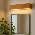 Rectangular Solid Wood LED Wall Light provides sleek, modern illumination for any bathroom.