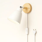 Enjoy customizable, minimalist lighting with this adjustable wall light's subtle white glow.