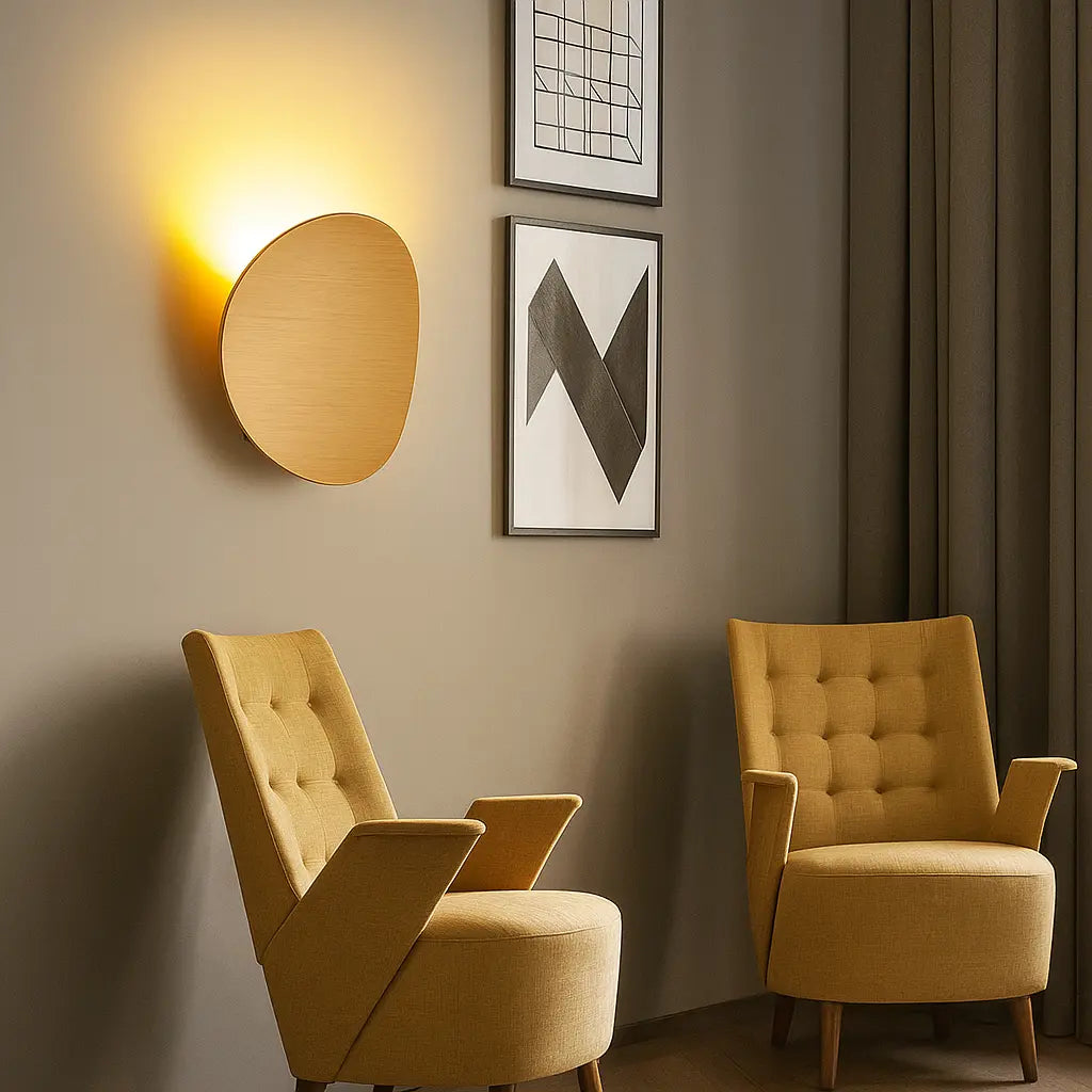 Modern Aluminum Round LED Wall Sconce mounted on wall, emitting soft ambient light.