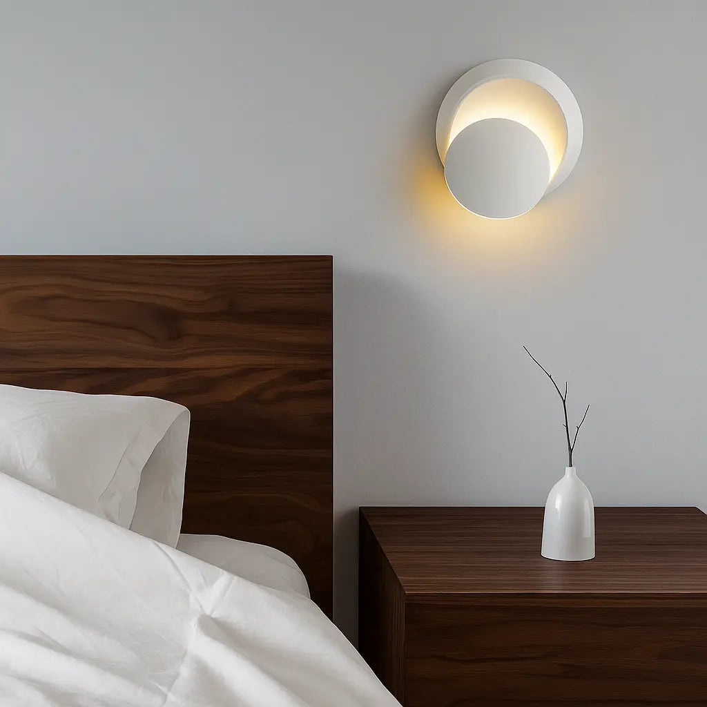 Soft yellow light from the ORLUNE HOME LED wall sconce creates a cozy, modern glow.