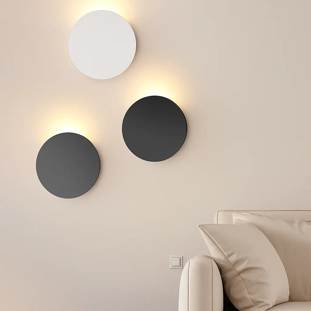 ORLUNE HOME Black LED Wall Lights and a white fixture create a soft, modern glow.