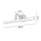 Line drawing of brass gold wall LED lamp, 45x19x15 cm, curved arm, cylindrical shade.