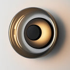 Soft, warm LED glow with a modern metallic finish and stylish circular design.