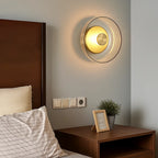 The ORLUNE HOME circular LED wall light emits a cozy, inviting warm glow.