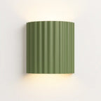Soft indirect LED glows from both edges, creating gentle illumination with ribbed green style.