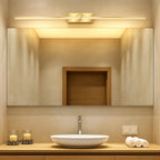 Sleek Modern LED Bathroom Wall Light IP44 emits warm, inviting illumination above the mirror.