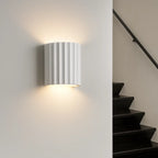 Soft, warm LED light glows upward and downward for elegant, modern ambient illumination.