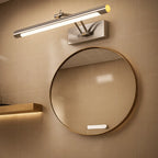 A sleek Modern Aluminum LED Bathroom Wall Light mounted on beige tiled wall, softly illuminated.