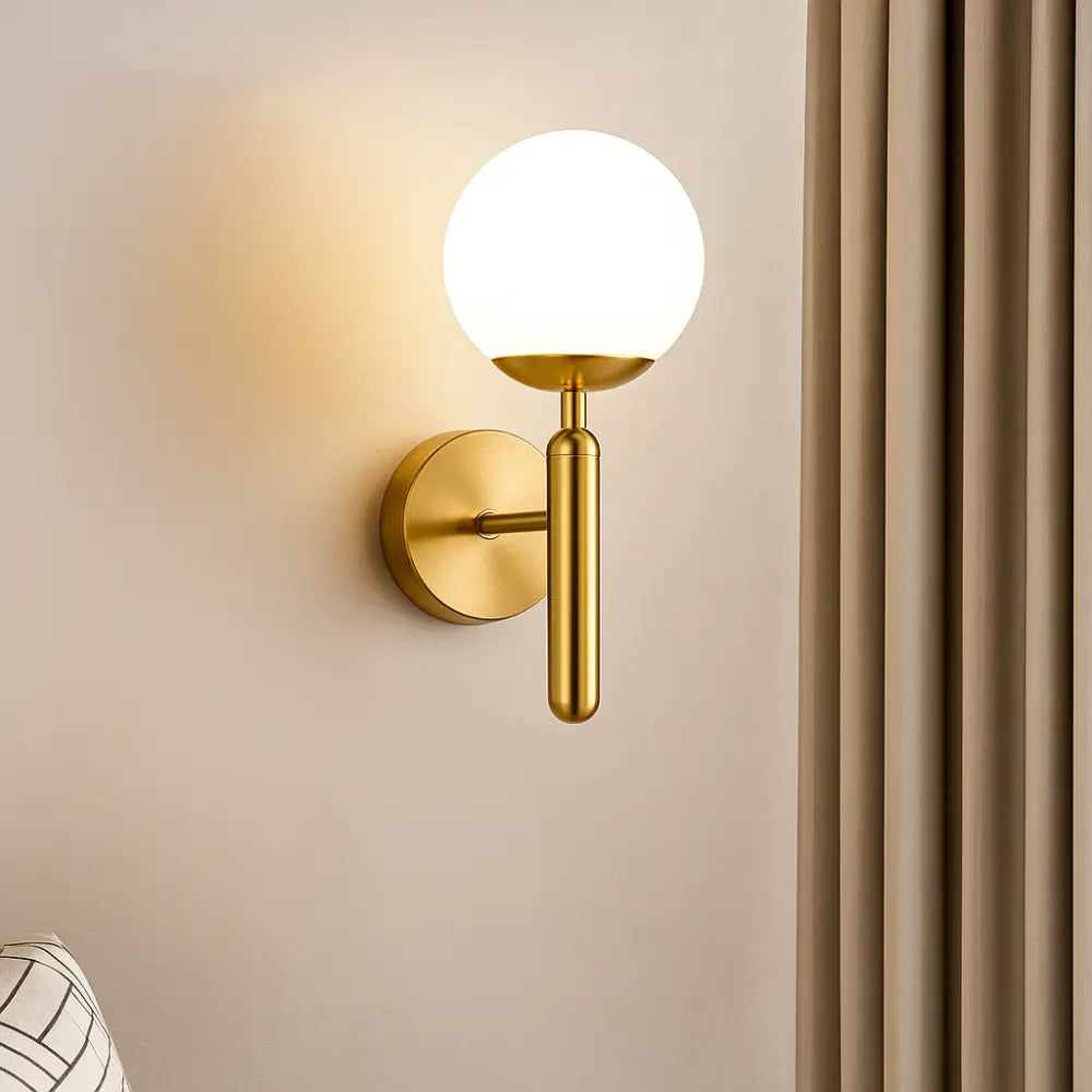 The ORLUNE HOME Gold Globe Wall Light brightens your space with elegant, modern lighting.