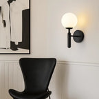 The ORLUNE HOME Modern Gold Metal Glass Globe Wall Light brightens with contemporary elegance.