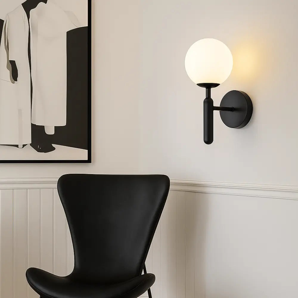 The ORLUNE HOME Modern Gold Metal Glass Globe Wall Light brightens with contemporary elegance.