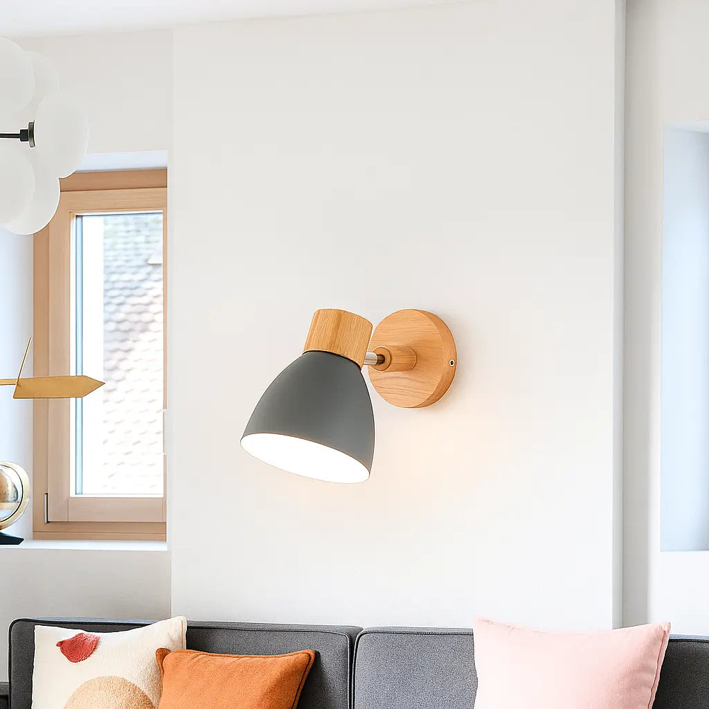 The Nordic wall light’s colorful shade brightens the room with cheerful, natural illumination.
