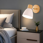 The ORLUNE HOME Nordic wall light emits a warm, cozy glow with its colorful shade.