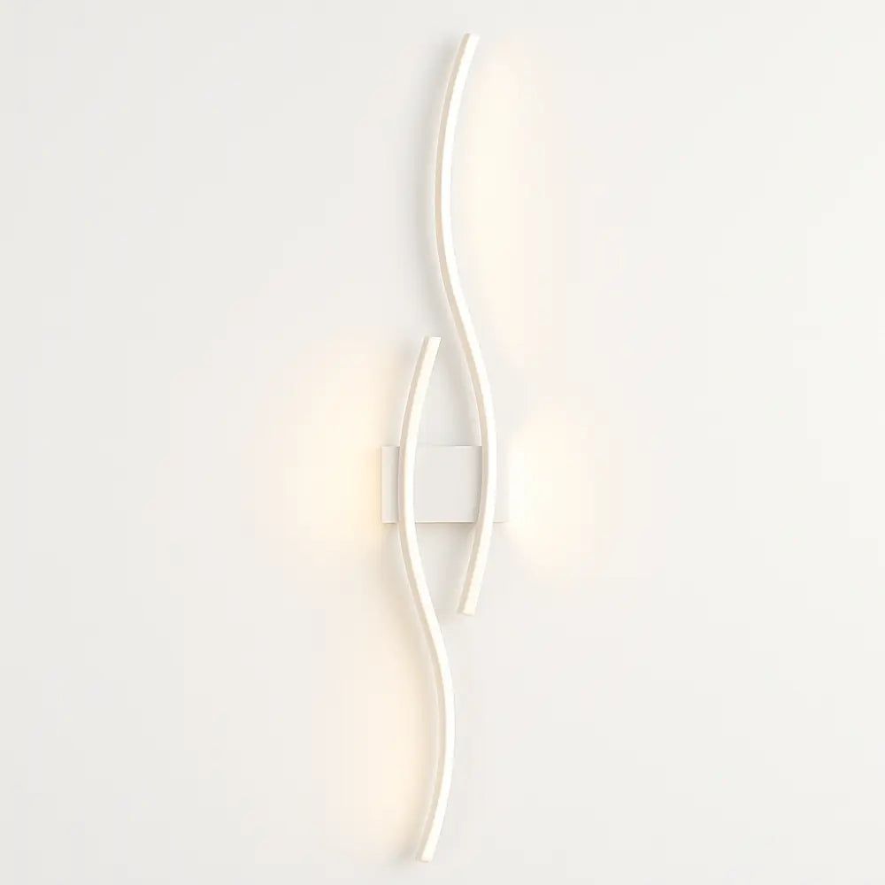 Soft, indirect LED wave wall light brightens your space with sleek, modern curves.
