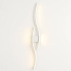 Soft, indirect LED wave wall light brightens your space with sleek, modern curves.