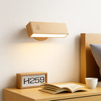 The ORLUNE HOME USB LED Wall Light provides warm, focused lighting for night reading.