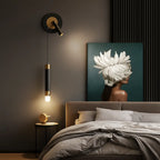 Adjustable LED Wall Light, cylindrical aluminum with acrylic accents, mounted on the wall.