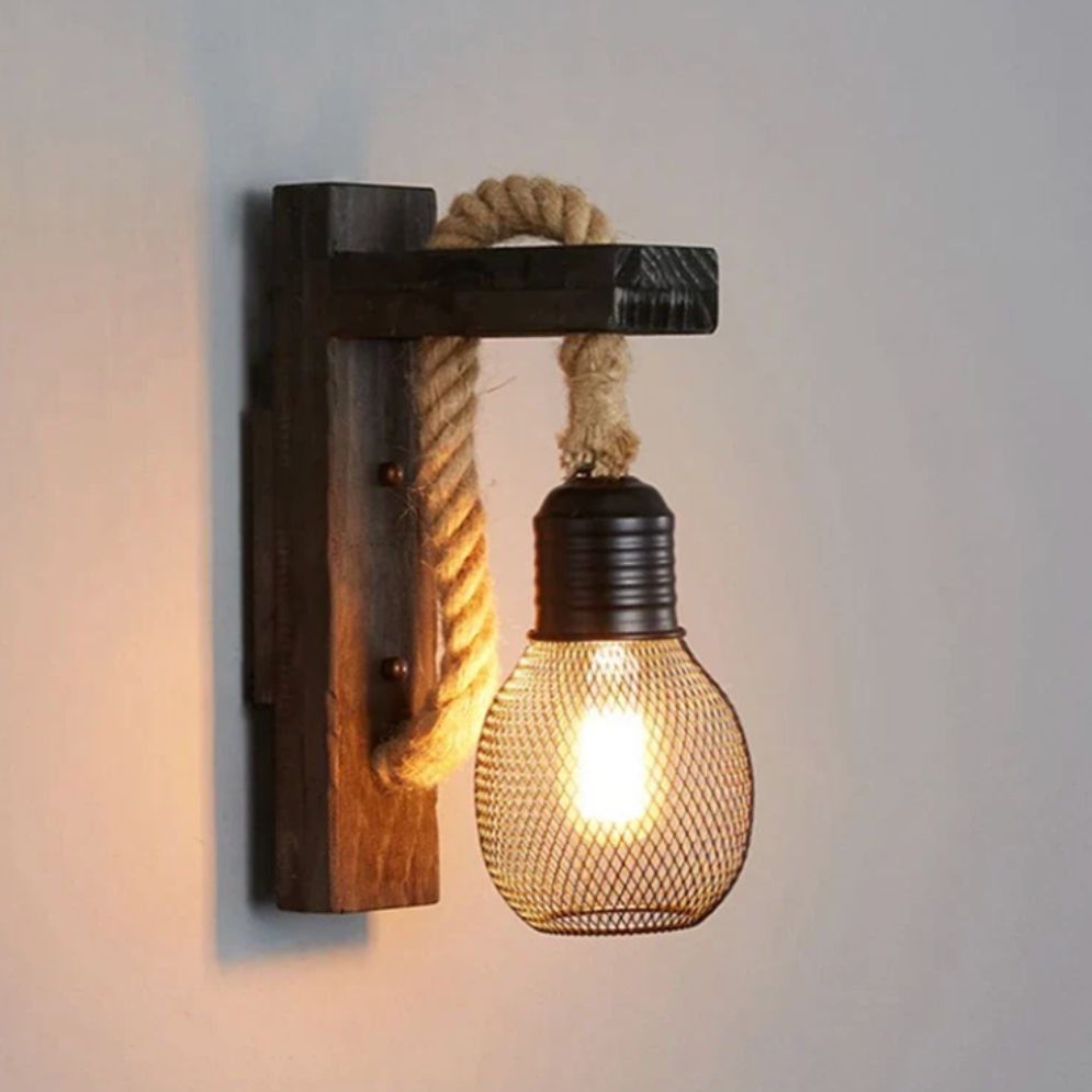 A square wood LED wall lamp with thick rope, metal mesh cage, and dark base.