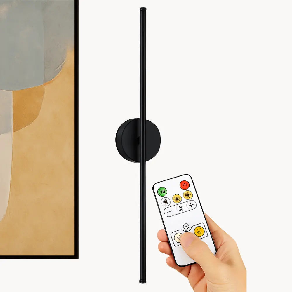 Adjustable Black Gold LED Kitchen Wall Light (50cm) mounted vertically on a plain wall.