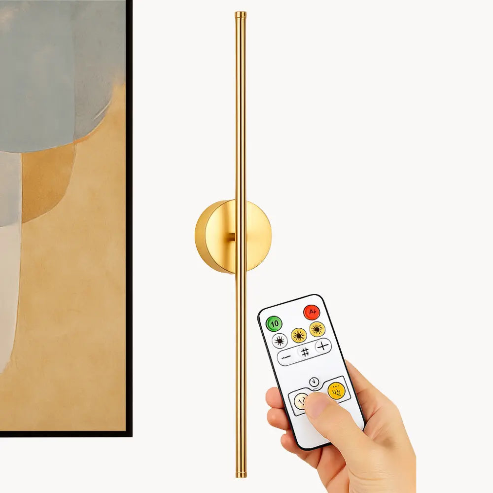 Adjustable Black Gold LED Kitchen Wall Light 50cm, slim, vertical, mounted on white wall.
