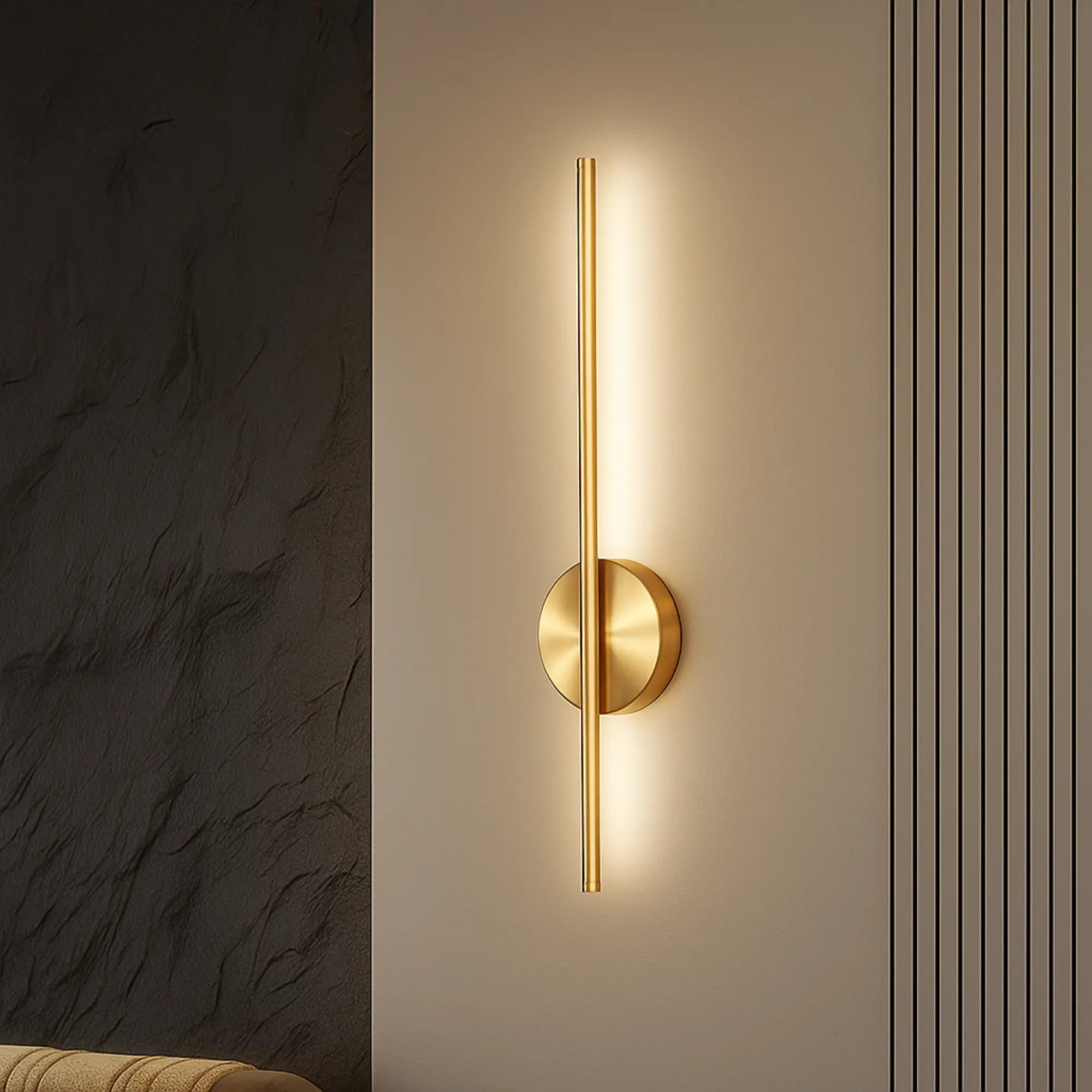 Adjustable black and gold 50cm LED kitchen wall light, vertical with round base, illuminated.