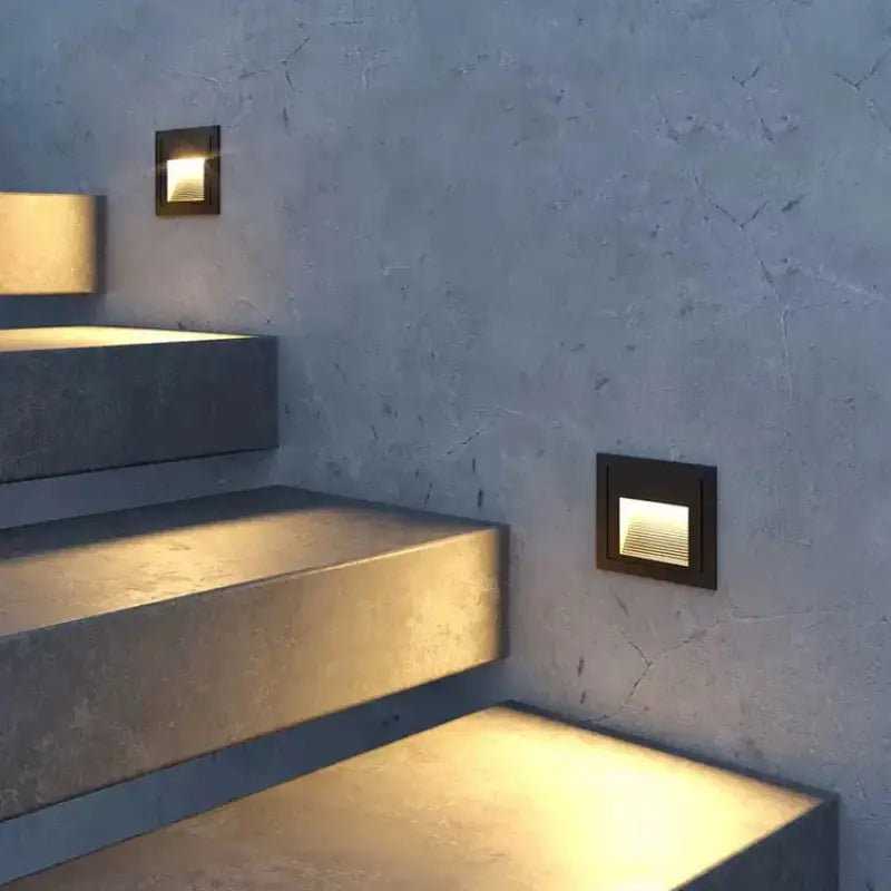 Aluminum outdoor wall spotlight with weather-resistant, soft-glow illumination; sleek, modern design.