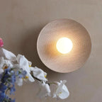 The ORLUNE HOME Nordic LED Wall Light casts a warm, minimalist circular glow.