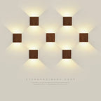 Nordic wooden LED wall lights create clean, geometric beams in a striking arrangement.