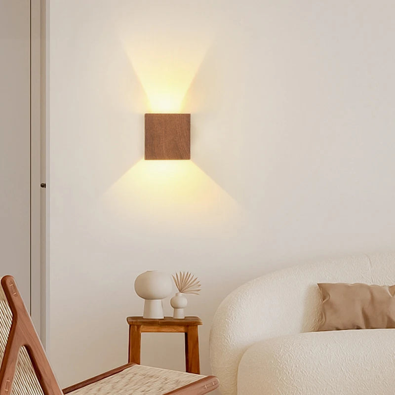 The Nordic LED wall light softly casts up-and-down illumination along a white wall.