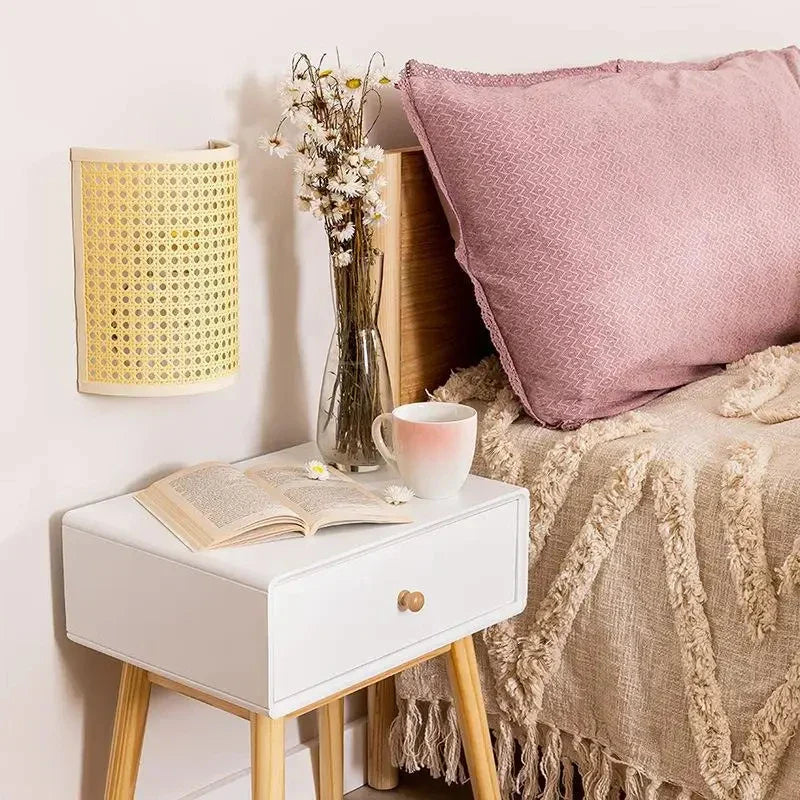 ORLUNE HOME Japanese Rotin LED wall light creates a soft, calming nighttime glow.