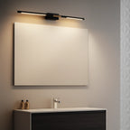 Luminaire mural LED noir et doré LUMINAIRE MAISON, élégant, design linéaire au-dessus du miroir.