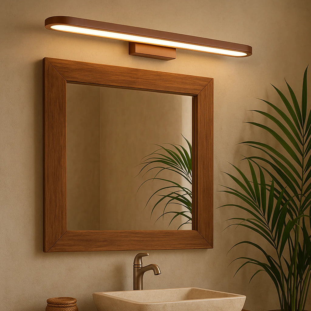Luminaire mural LED marron moderne fin, design épuré, monté au-dessus d'un miroir.