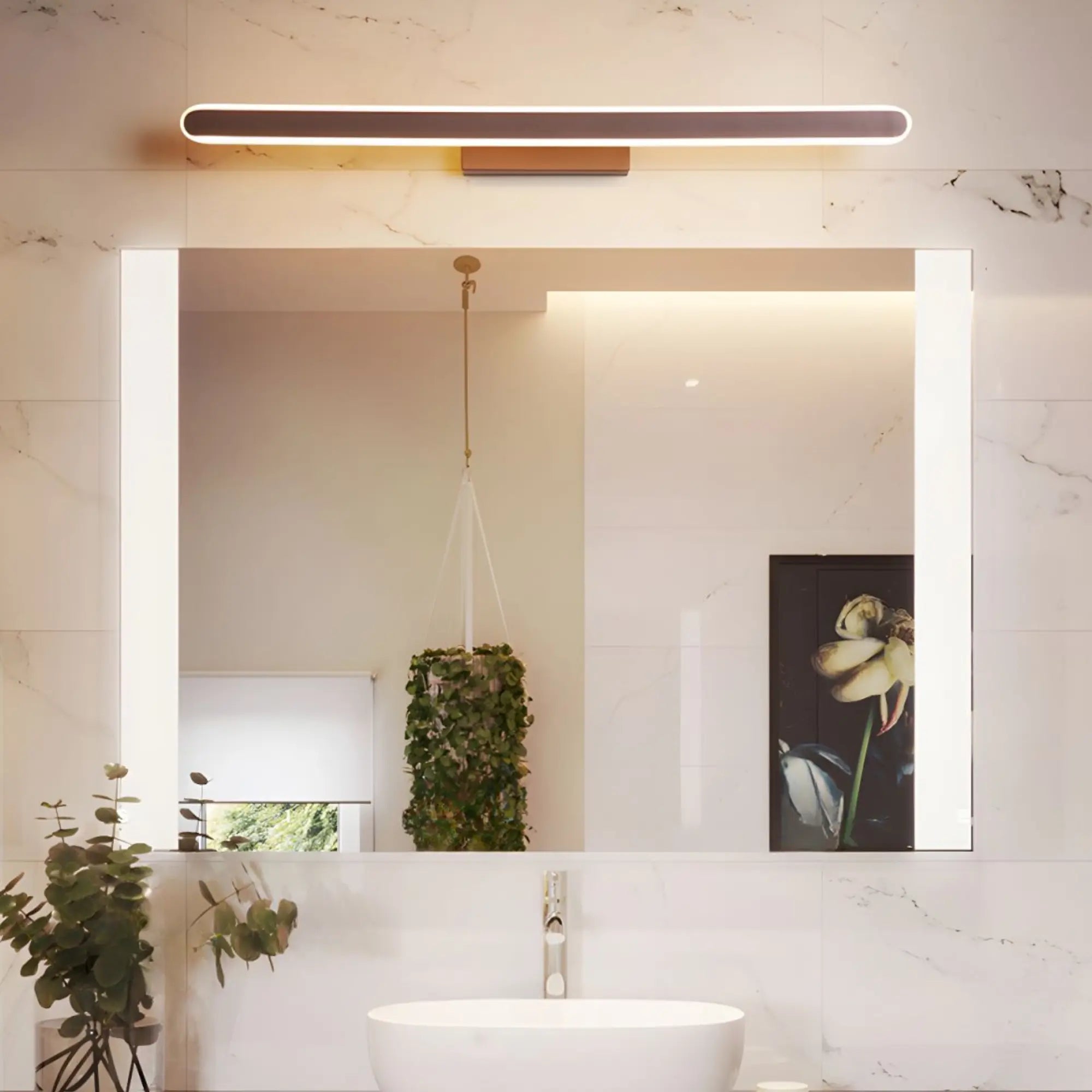 The ORLUNE HOME LED wall light casts a bright, stylish glow above the mirror.