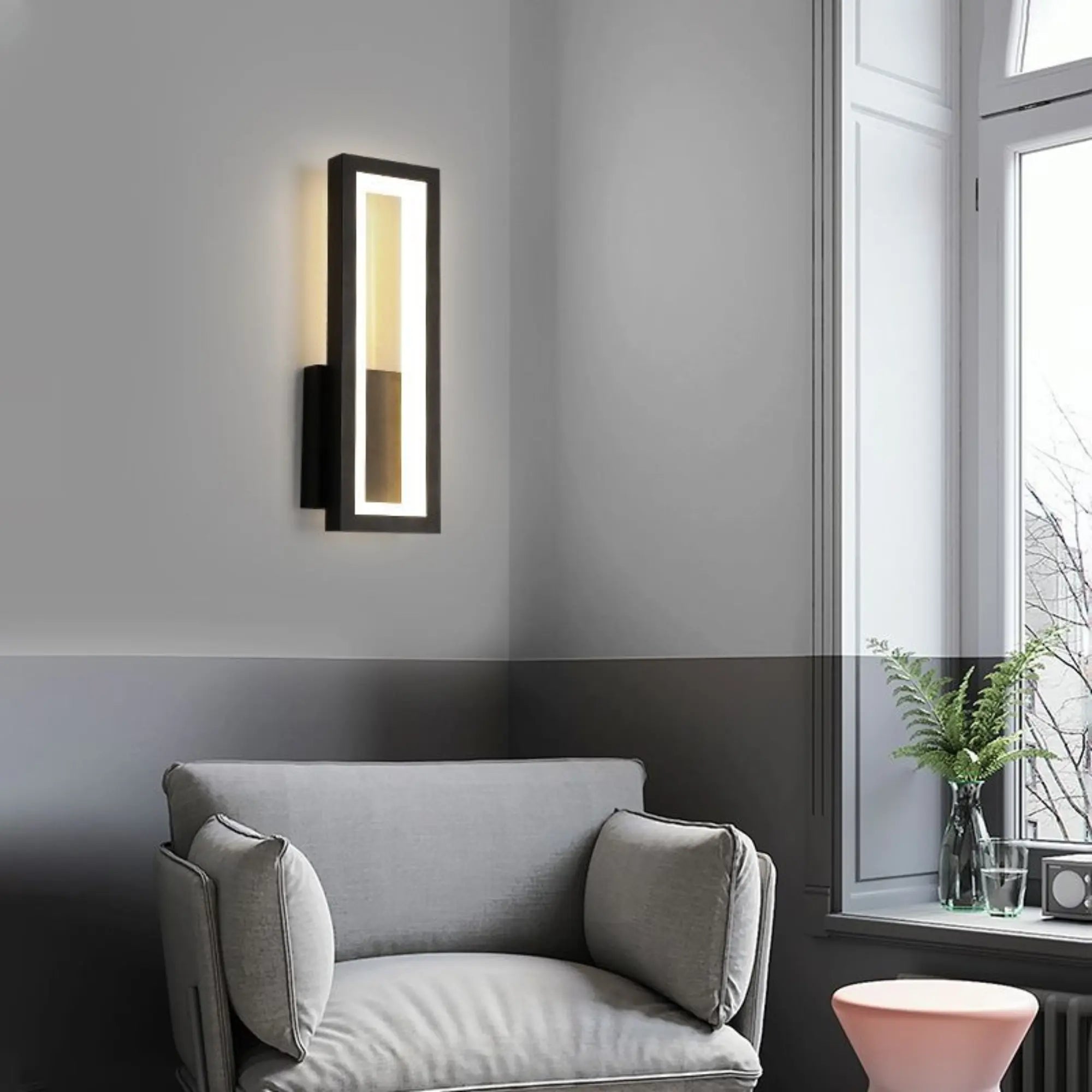 The ORLUNE HOME LED Wall Light adds sleek, minimalist illumination to the space.