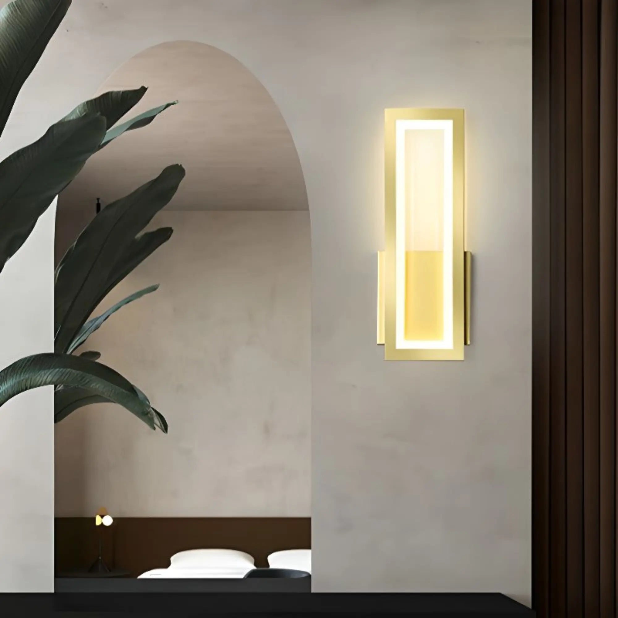 Warm LED wall light illuminates the space with a minimalist, modern glow.
