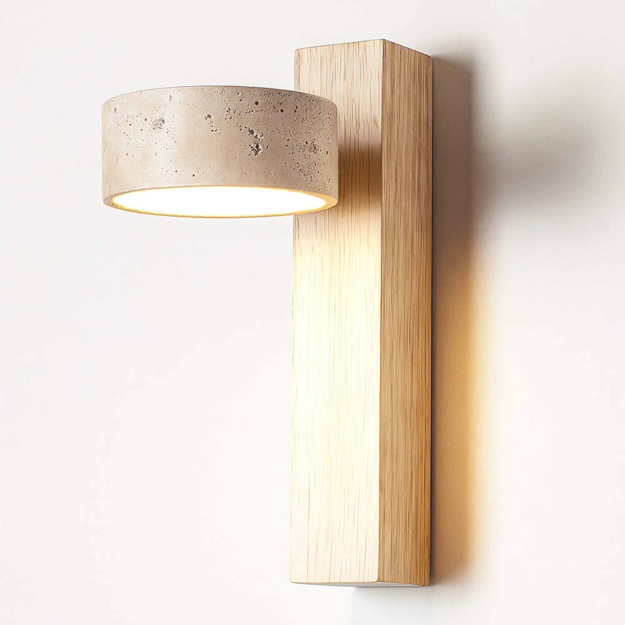 Warm LED light flows softly downward from the sconce, creating a gentle ambiance.