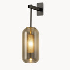 Experience elegant LED lighting with a sleek glass wall fixture and textured metal diffuser.