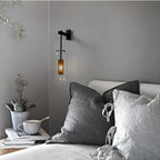 The ORLUNE HOME Vertical Glass Wall Light creates a soothing, inviting ambiance with its warm glow.