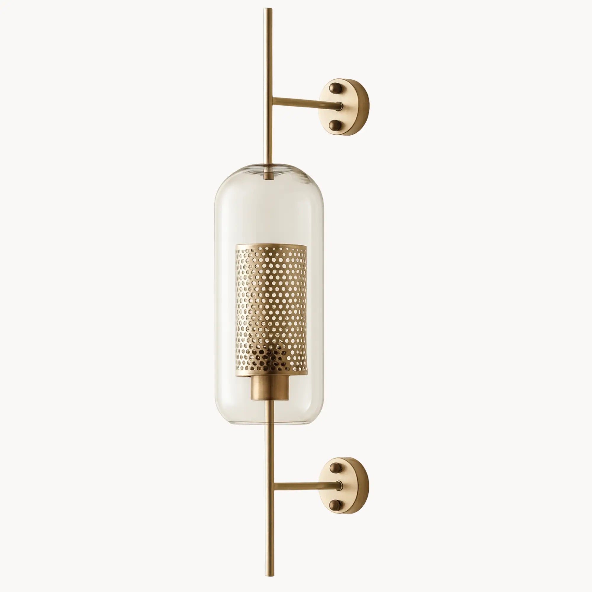 Bold modern lighting: Vertical brass rod, clear glass, and perforated diffuser create striking illumination.
