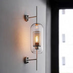 Warm light radiates through glass and metal mesh, enhancing any kitchen with contemporary style.
