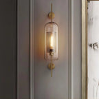 Soft, perforated brass light creates a cozy glow with the Modern Vertical Tube design.