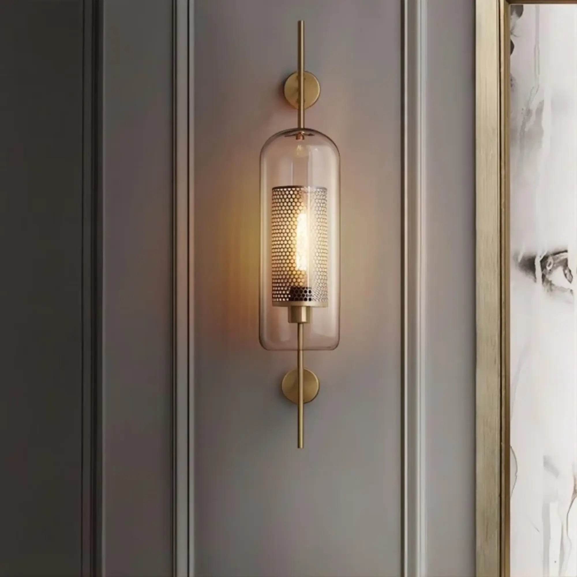 Soft, perforated brass light creates a cozy glow with the Modern Vertical Tube design.
